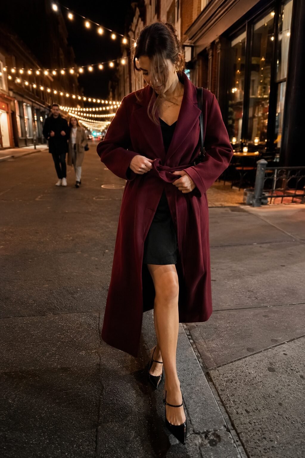 burgundy wrap coat evening outfit, belted coat over a black slip dress