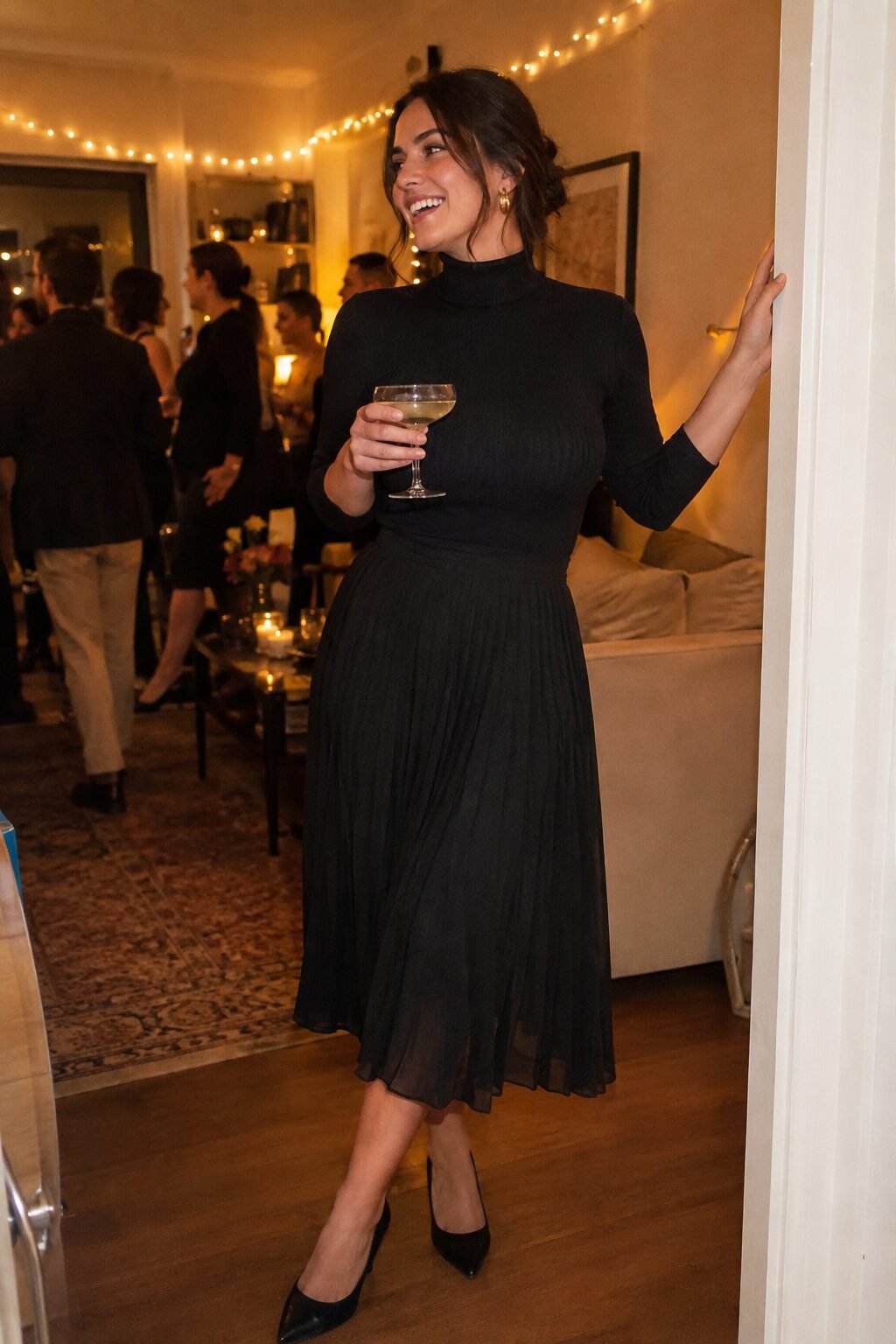 festive evening party outfit: black ribbed turtleneck bodysuit with a black chiffon pleated midi skirt