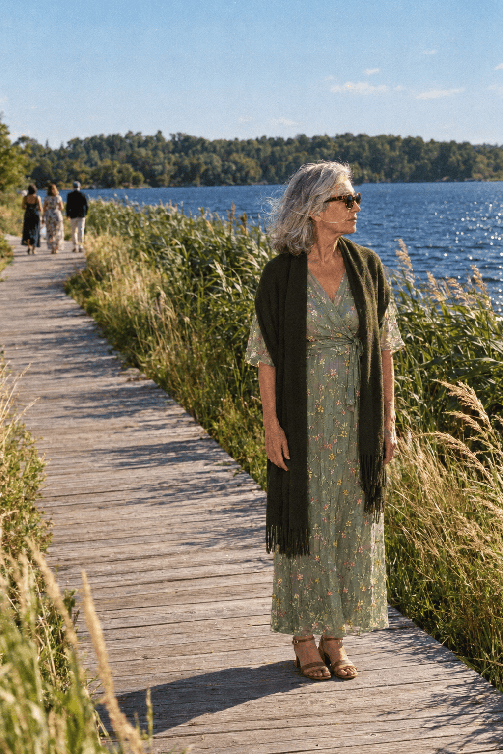 beach formal wedding guest outfit for women over 70: sage green embroidered flutter-sleeve maxi dress with an olive cashmere wrap and low tan sandals