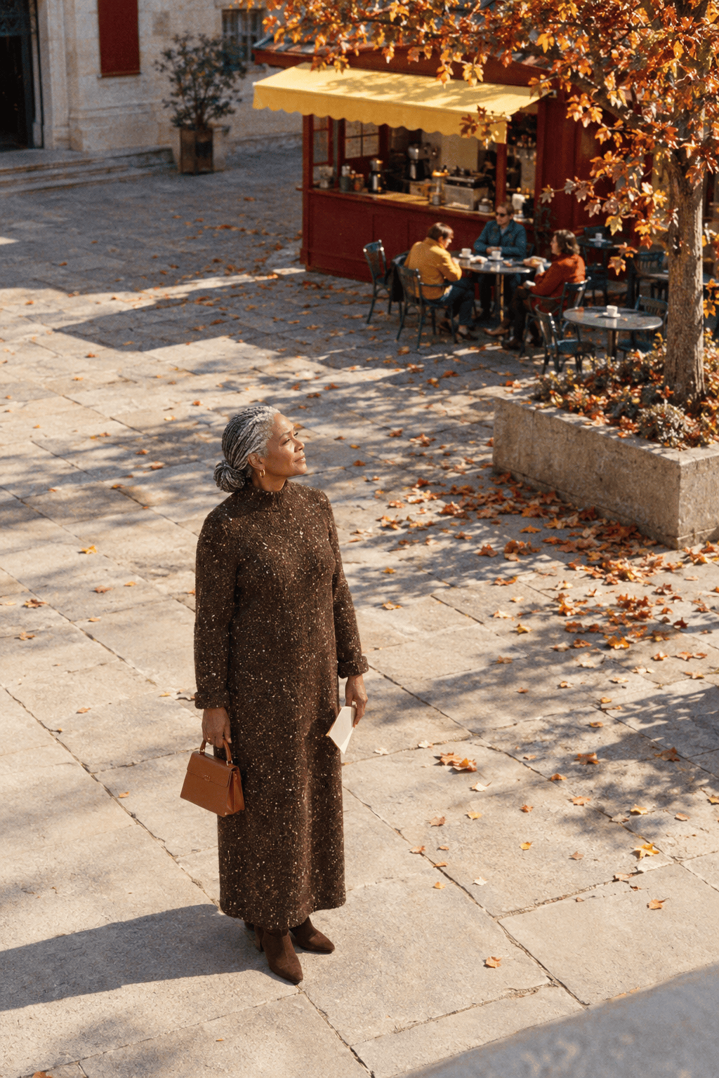 museum cafe lunch outfit for a woman in her 70s: ankle-length speckled dark brown merino-blend sweater dress with chocolate suede ankle boots and a small cognac top-handle bag