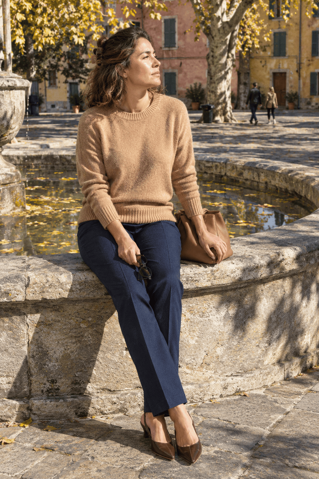 Massimo Dutti cashmere sweater review: woman in a camel cashmere crew neck sweater and navy wool trousers