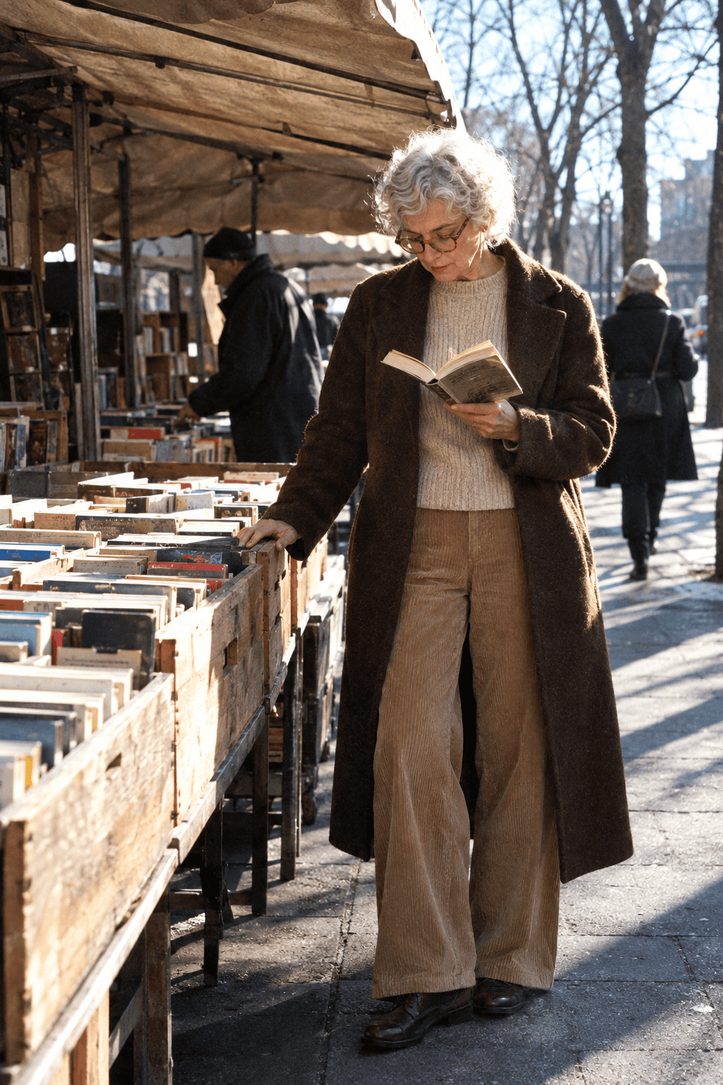 winter outfits for women over 60: dark brown double-face long coat, oat ribbed crewneck and latte wide-leg corduroy trousers