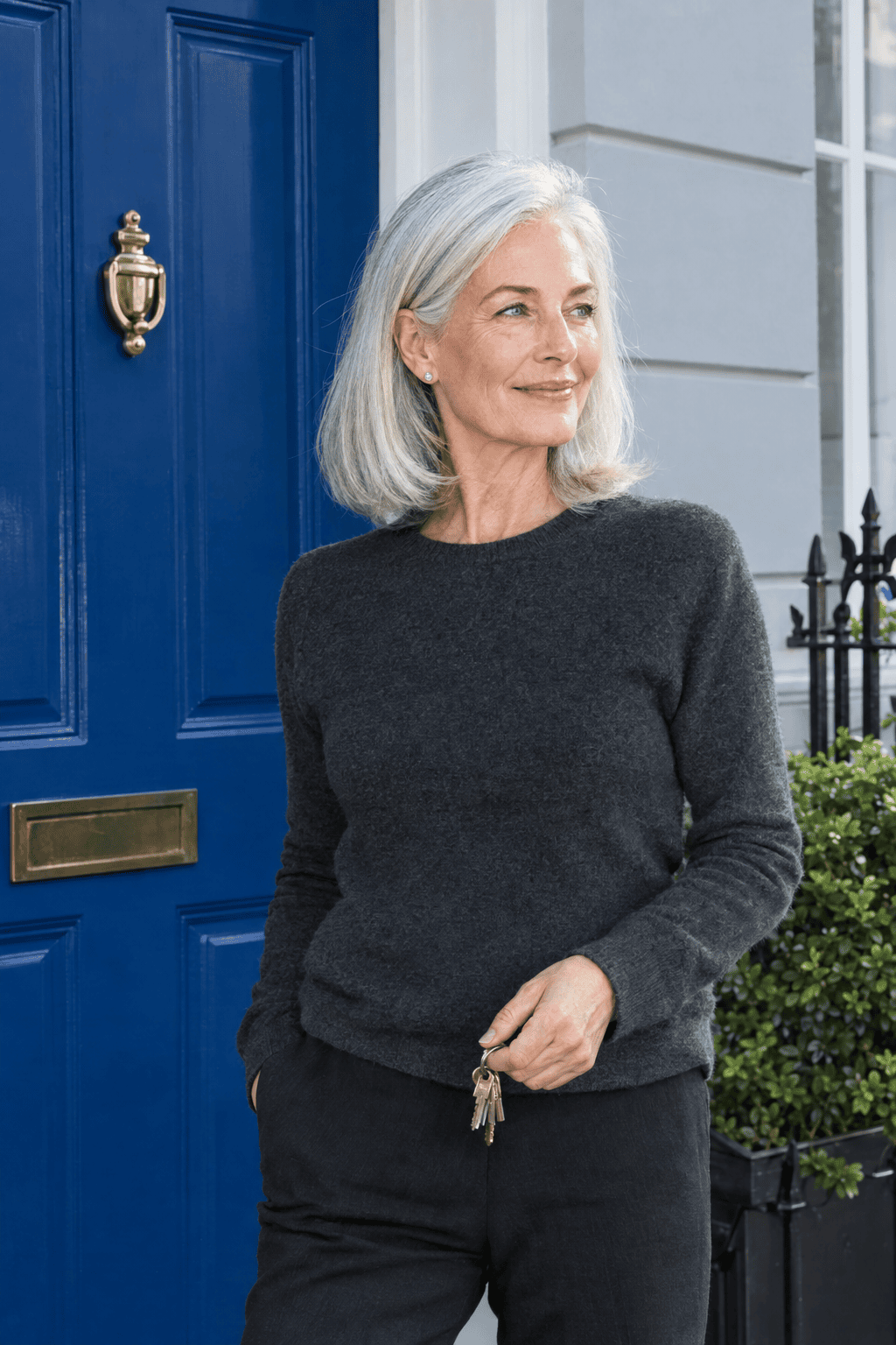 gray hairstyles for women over 60: glossy cool silver hair with a polished smooth finish