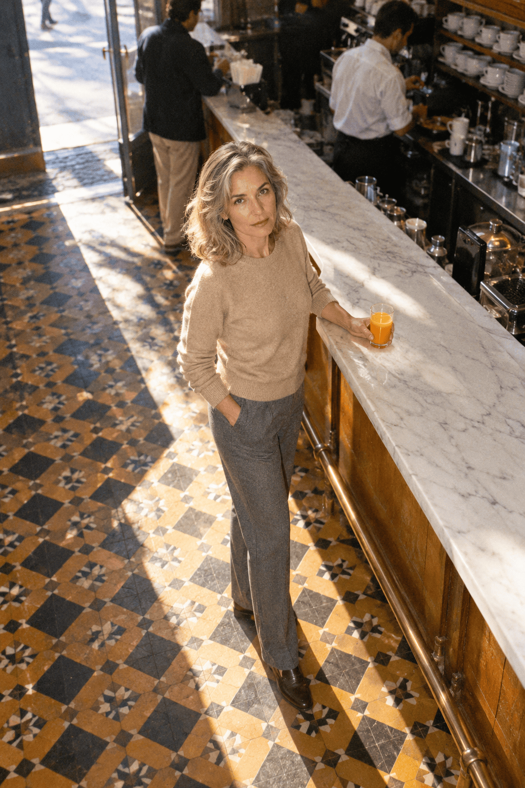 Old money clothing brands: Falconeri beige cashmere crewneck sweater with grey trousers