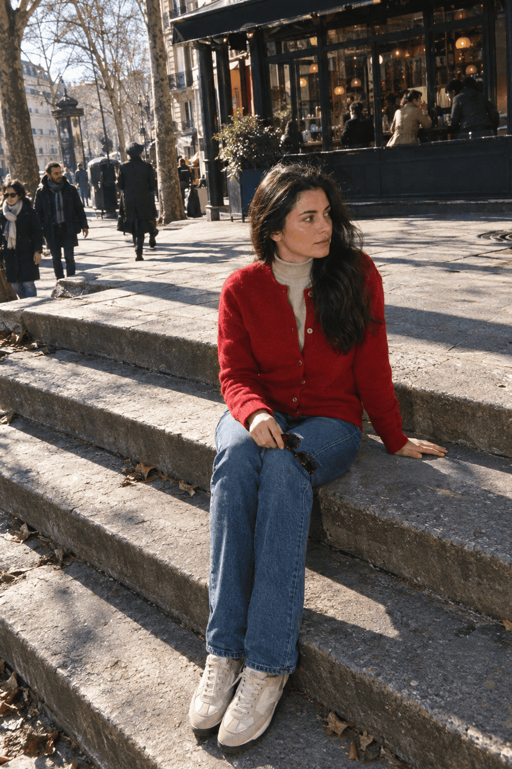 casual winter outfit: crimson red merino cardigan, linen beige turtleneck, mid blue straight jeans and birch suede and leather sneakers