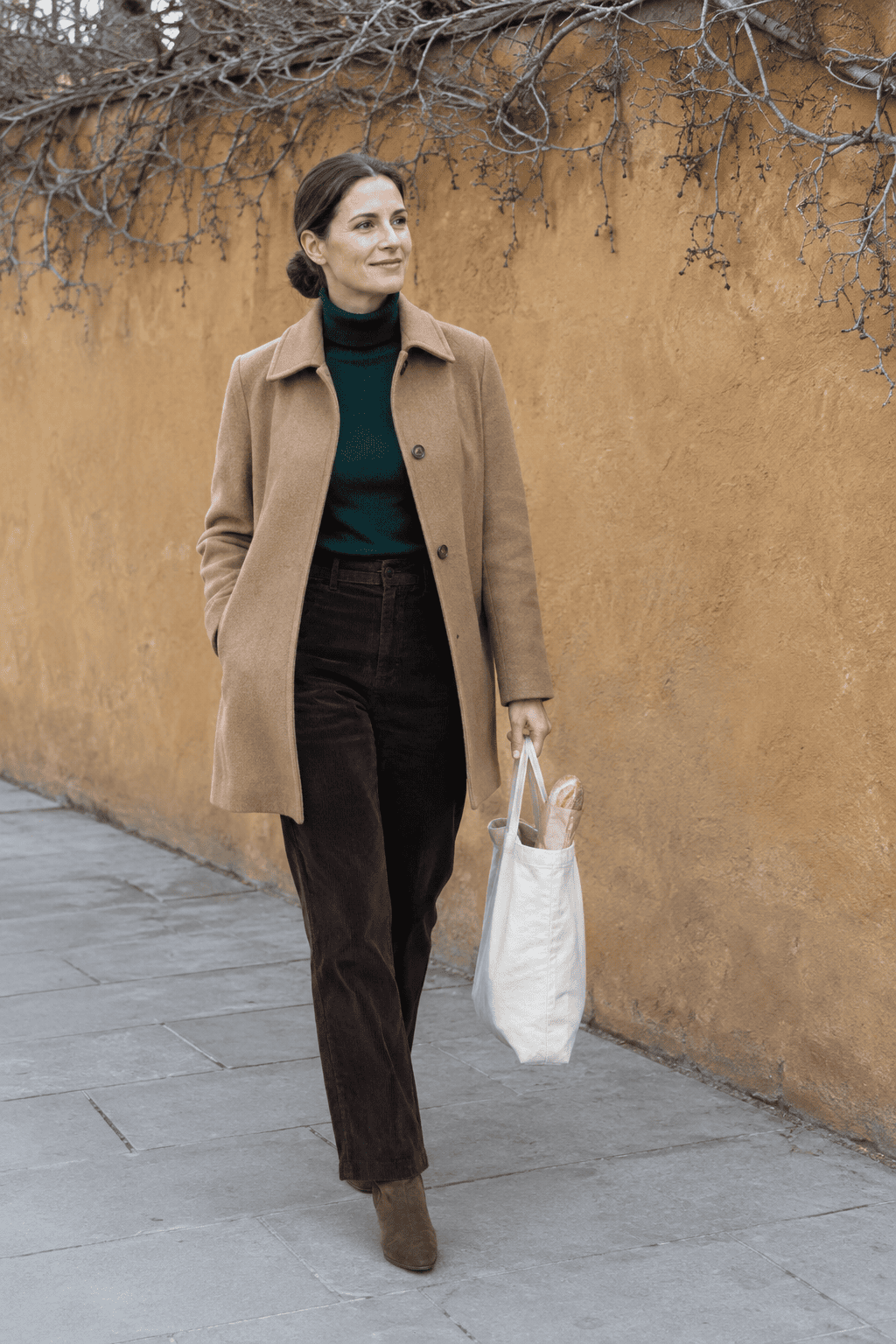 old money milan saturday outfit: short camel single-breasted coat, bottle green cashmere turtleneck, chocolate corduroy straight trousers and brown suede ankle boots